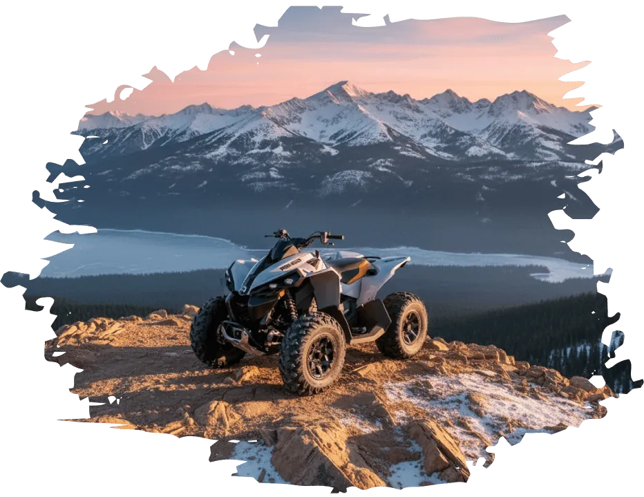 ATV rental parked on a scenic rocky overlook with mountain views